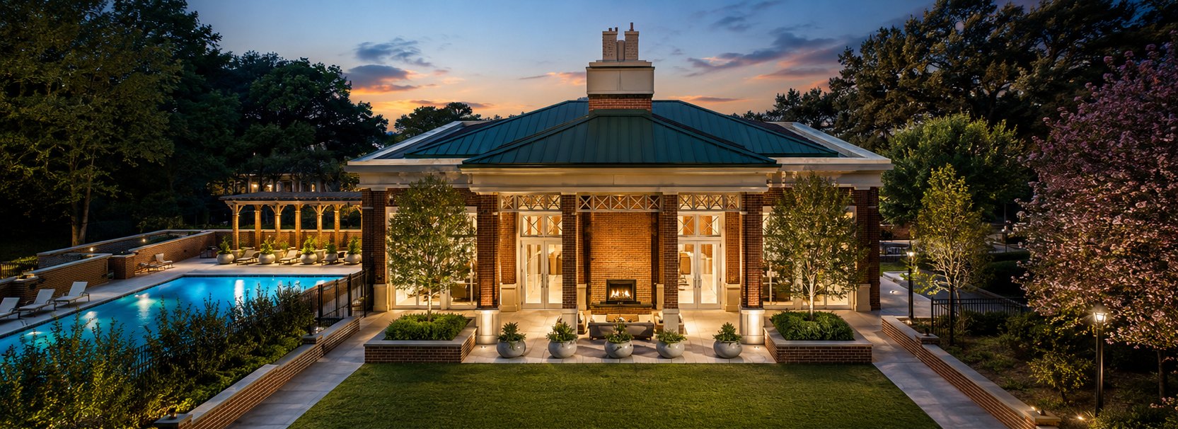 The Brookwood clubhouse and saltwater pool at dusk