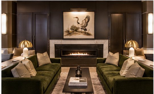 Clubhouse lounge with gas fireplace and velvet seating